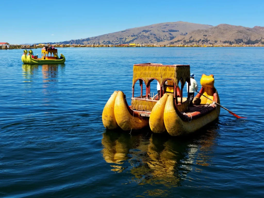 Traditional totora reed boats at the Uros floating islands on Lake Titicaca Peru